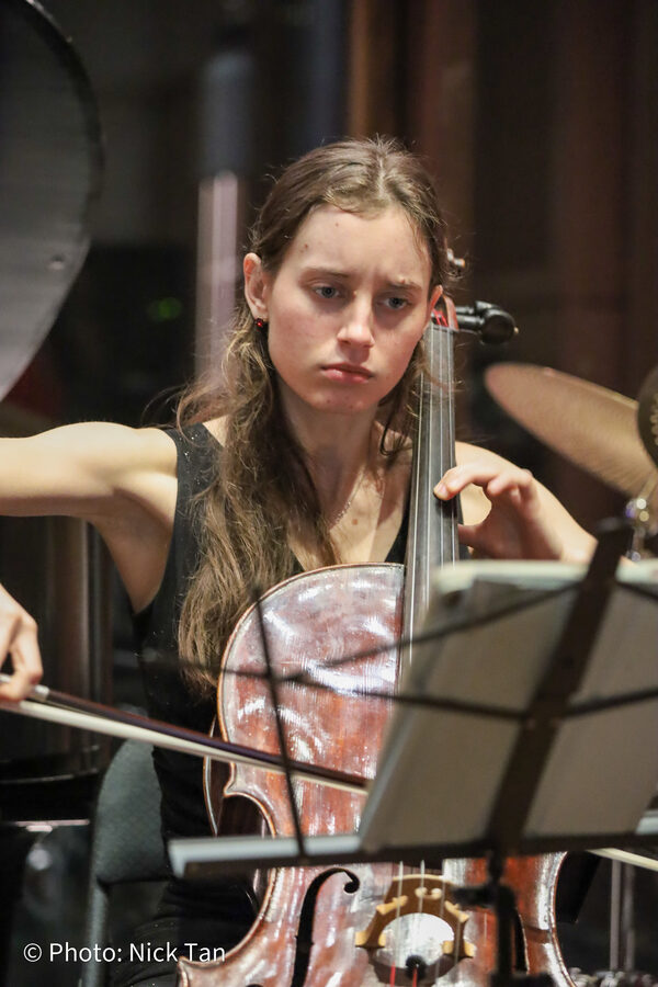 Martha playing in an orchestra